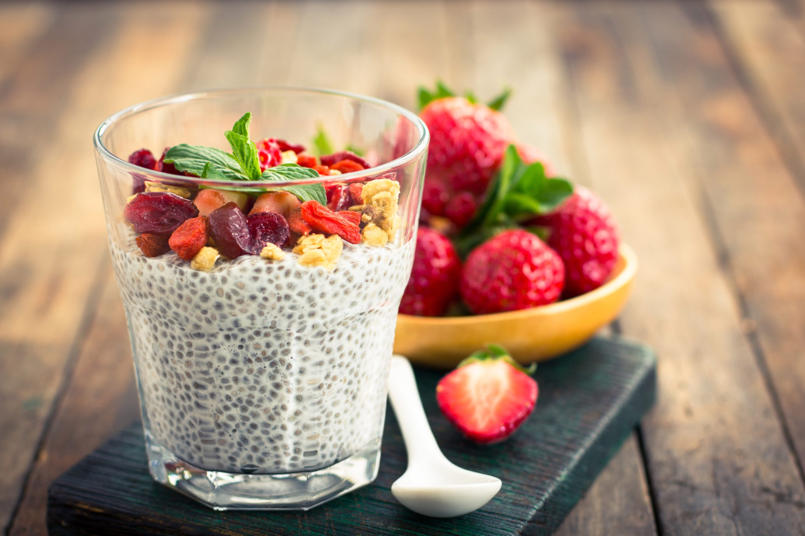 Healthy Chia seed pudding with strawberries, cranberries, and goji berries 